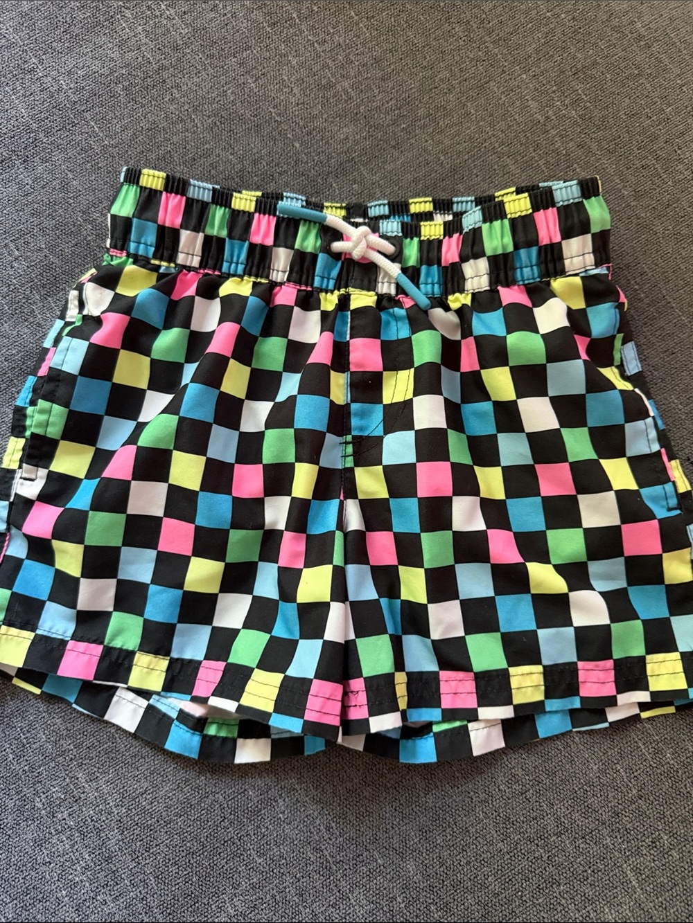 art class Black Checkerboard Swim Shorts with Pink, Blue & Green